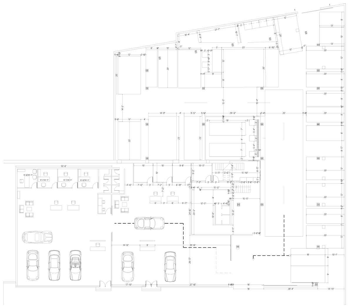 Kalma Motors architectural ground-floor layout showing the showroom and workshop programme; drawing is not to scale